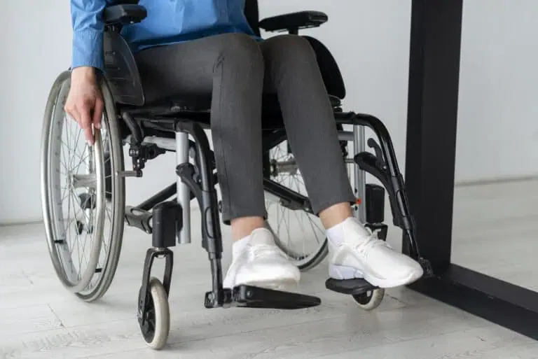 close up woman wheelchair office