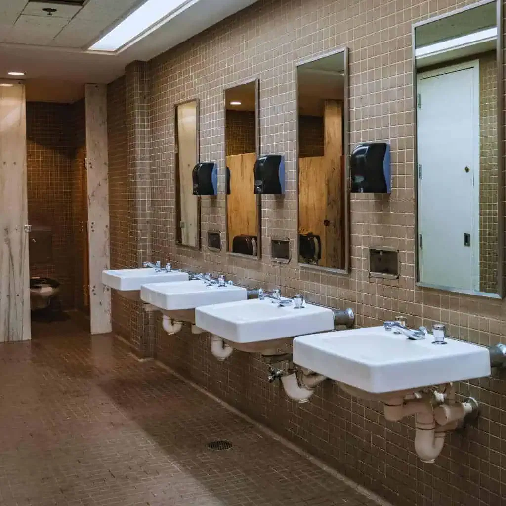 Wall Mounted Sinks with ADA Knee Clearance in Public Restroom