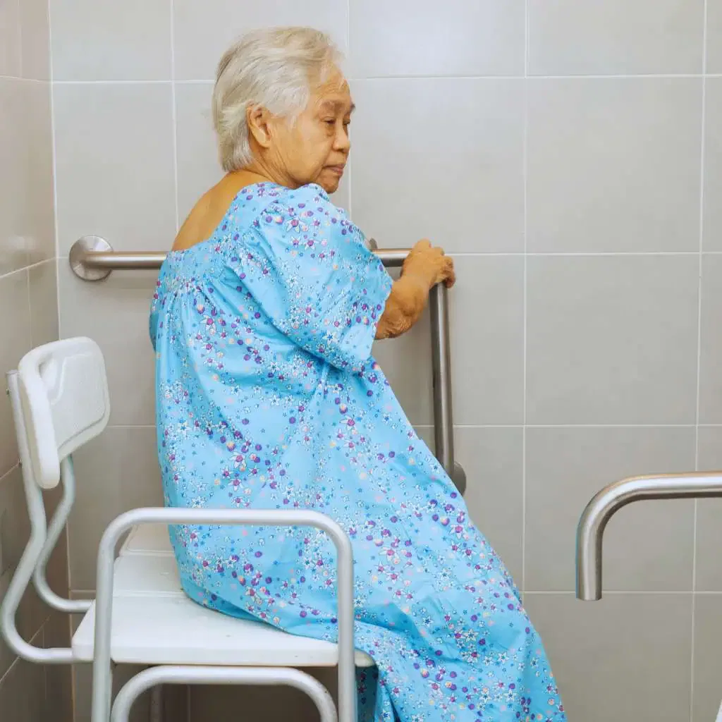 Accessible Shower Seat and Grab Bar Use in an ADA Compliant Bathroom