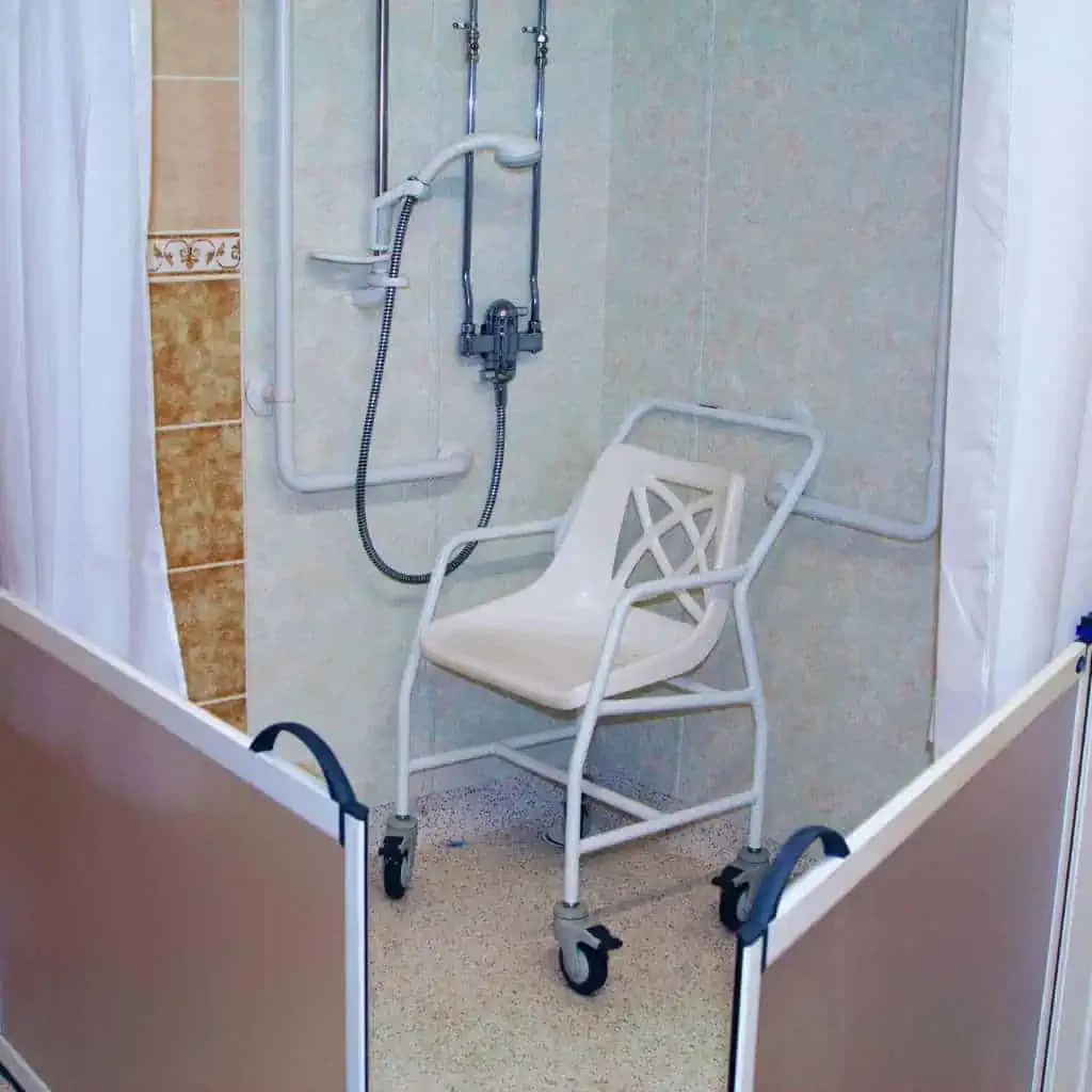 Transfer Shower With Folding Seat and Grab Bars in California Facility