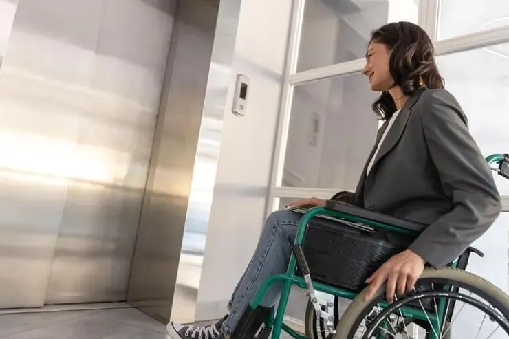 businesswoman wheelchair corporate office waiting lift 259150 80541