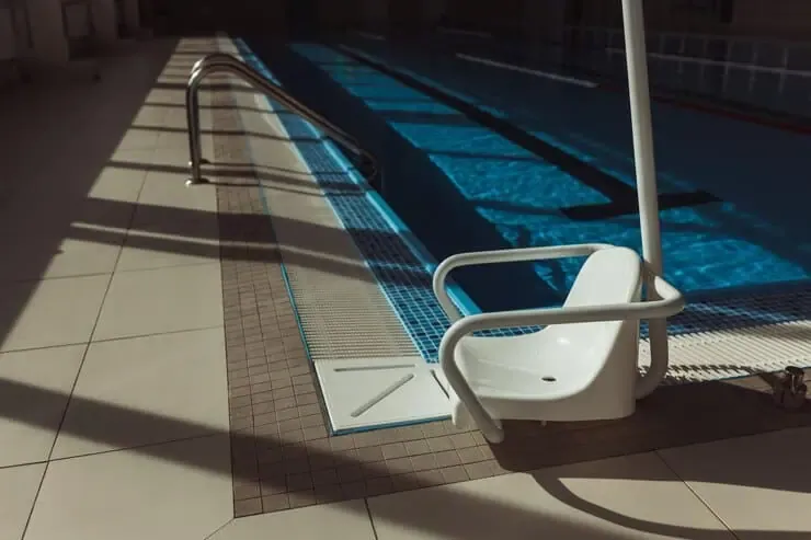 chair lift disabled people installed poolside swimming pool sunny day 594501 953