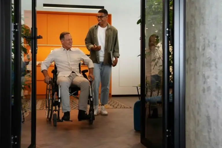 man wheelchair having inclusive office job 1