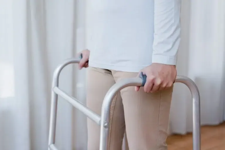 vecteezy cropped view of elderly man walking with frame at home 38447974 2