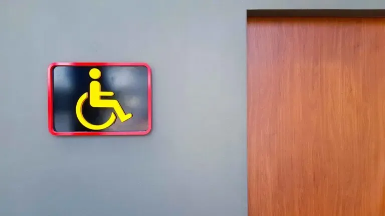 vecteezy toilet sign on gray or grey wall for reserved disable people 13405504 1