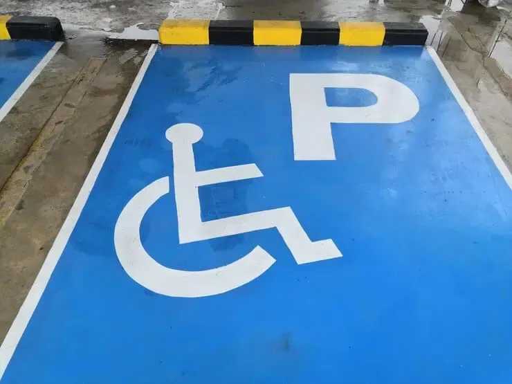 high angle view parking wheelchair access sign road 1048944 28575611